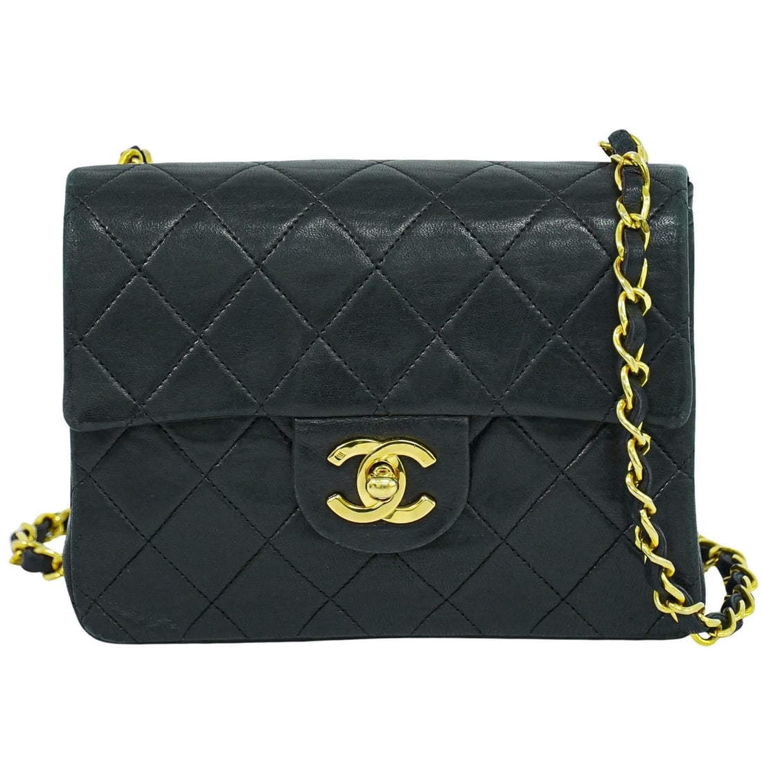Chanel Vintage Square Flap Leather Bag: Chanel Vintage Square Flap Leather Bag This Chanel Vintage Square Classic Single Flap Bag is crafted from quilted black leather, offering a timeless and elegant look. Designed for unisex use, it featu