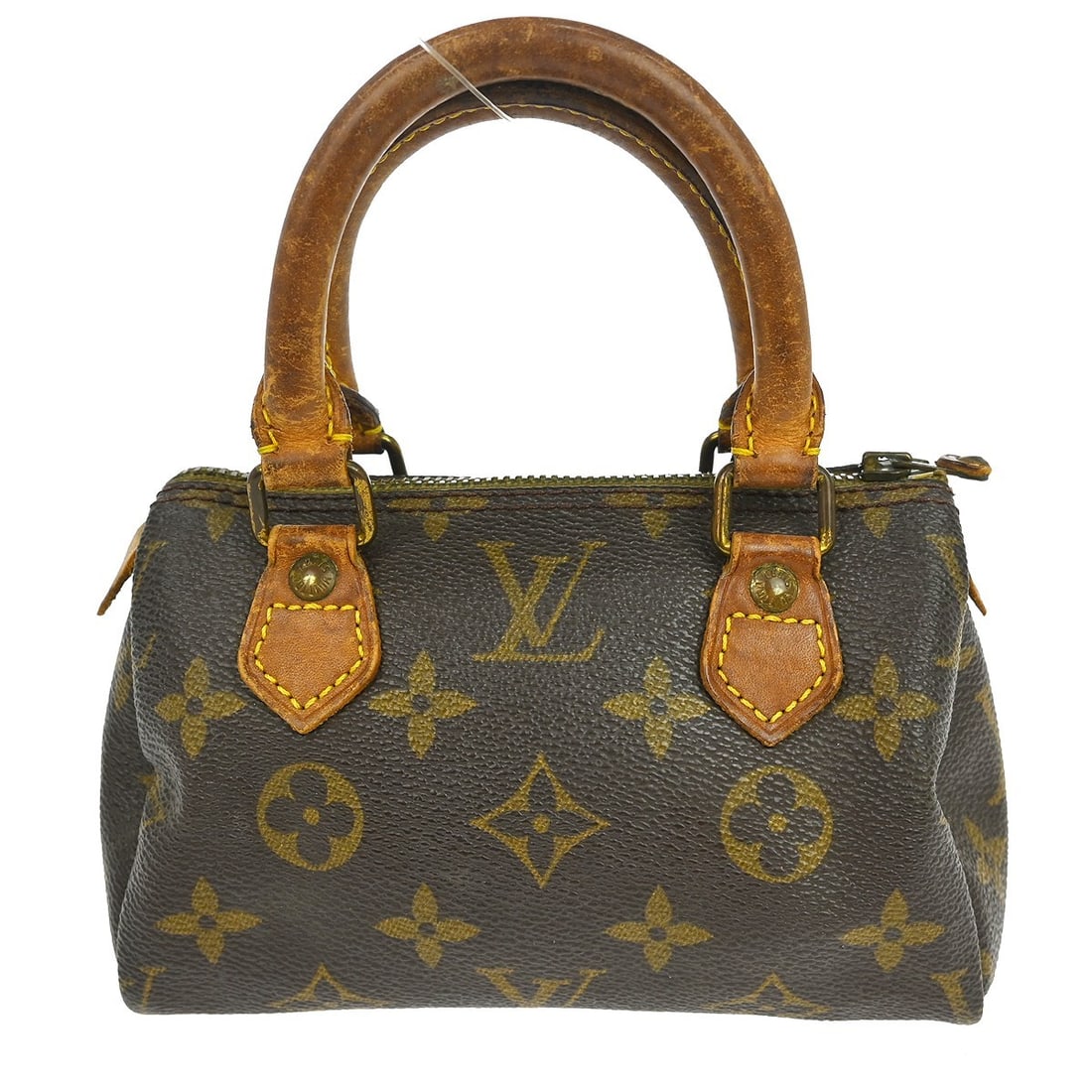 Louis Vuitton Speedy Mini Monogram Canvas Handbag: Louis Vuitton Speedy Mini Monogram Canvas Handbag This Louis Vuitton Mini Speedy handbag features the iconic monogram canvas leather in brown, complemented by a zip closure and a compact mini size. De