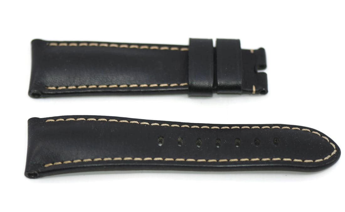 Panerai Authentic Black Leather Watch Strap 26mm: Panerai Authentic Black Leather Watch Strap 26mm This Panerai black leather strap is designed for wristwatches, featuring a sleek black color that complements any watch face. With a width of 26 mm, it