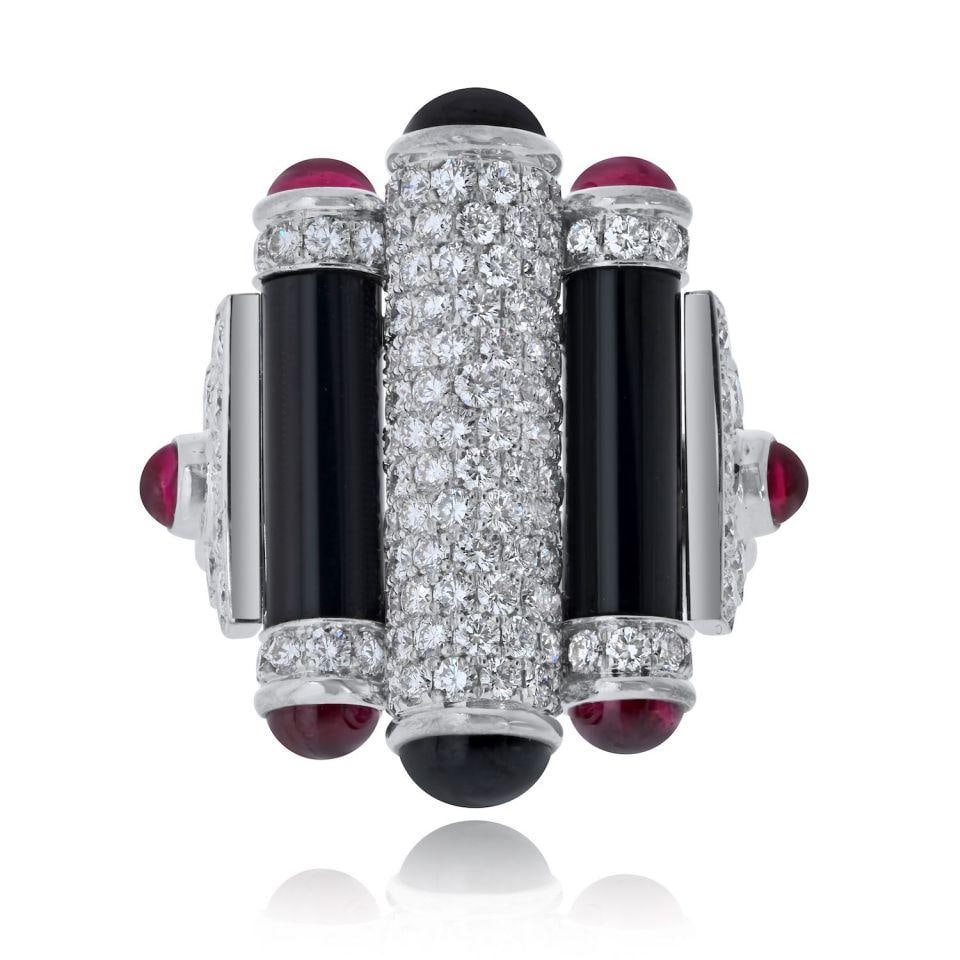 Rouleaux Estate Ring in 18K White Gold Size 5: Rouleaux Estate Ring in 18K White Gold Size 5 This pre-owned Cartier Rouleaux ring is crafted from 18K white gold and features approximately 1.86 carats of diamonds. The ring is a size 5 and has a
