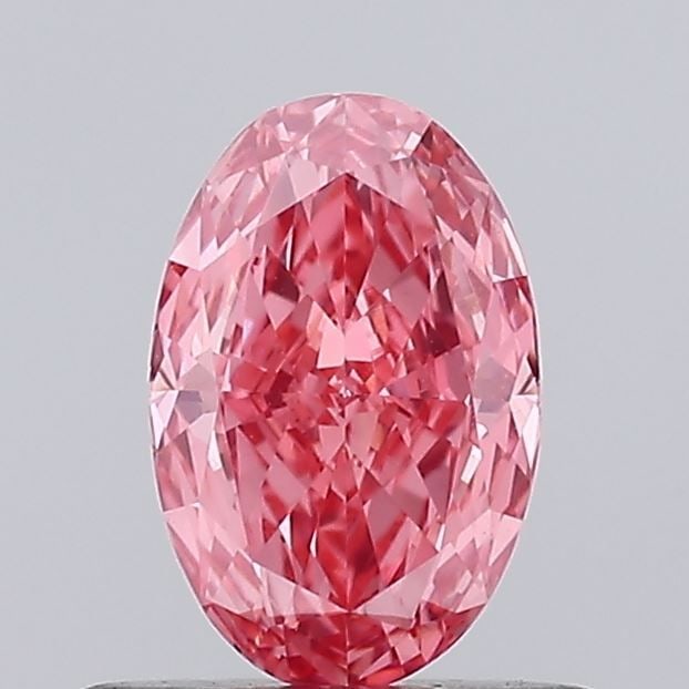 Loose Diamond - OVAL 0.46ct Fancy Vivid Pink VS1: Loose Diamond - OVAL 0.46ct Fancy Vivid Pink VS1 Source: This is a real non-mined Diamond that has been grown in a lab Shape: OVAL Carats: 0.46 Color: Fancy Vivid Pink Certification: IGI Video: Video