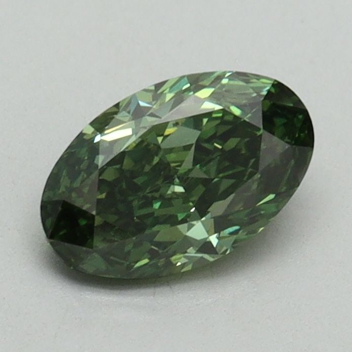 Loose Diamond - OVAL 0.83ct Fancy Vivid Green VS2: Loose Diamond - OVAL 0.83ct Fancy Vivid Green VS2 Source: This is a real non-mined Diamond that has been grown in a lab Shape: OVAL Carats: 0.83 Color: Fancy Vivid Green Certification: IGI Video: