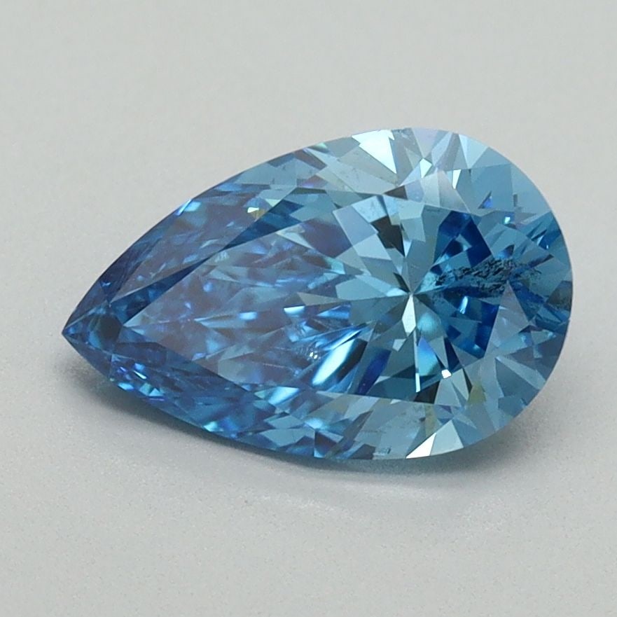 Loose Diamond - PEAR 1.46ct Fancy Vivid Blue SI1: Loose Diamond - PEAR 1.46ct Fancy Vivid Blue SI1 Source: This is a real non-mined Diamond that has been grown in a lab Shape: PEAR Carats: 1.46 Color: Fancy Vivid Blue Certification: IGI Video: