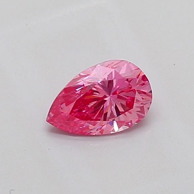 Loose Diamond - PEAR 0.61ct Fancy Vivid Pink VS1: Loose Diamond - PEAR 0.61ct Fancy Vivid Pink VS1 Source: This is a real non-mined Diamond that has been grown in a lab Shape: PEAR Carats: 0.61 Color: Fancy Vivid Pink Certification: IGI Video:
