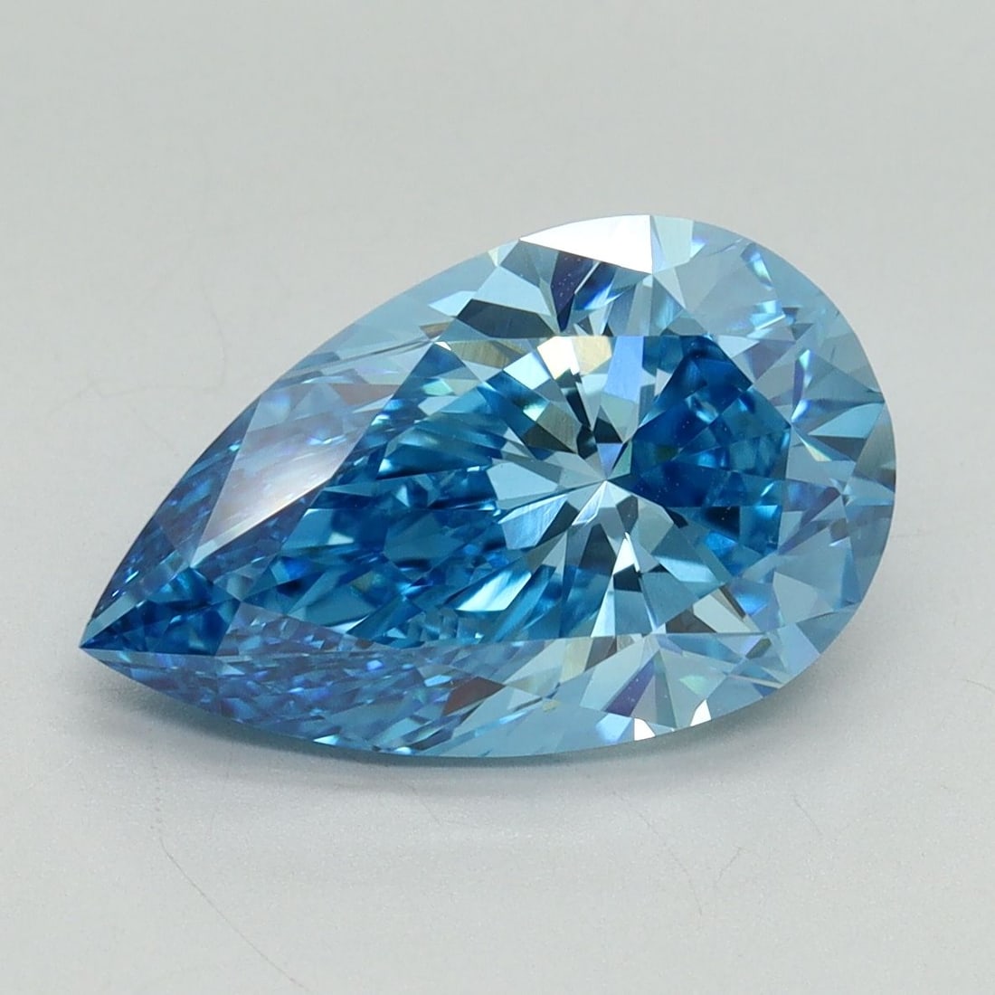 Loose Diamond - PEAR 4.03ct Fancy Vivid Blue VS1: Loose Diamond - PEAR 4.03ct Fancy Vivid Blue VS1 Source: This is a real non-mined Diamond that has been grown in a lab Shape: PEAR Carats: 4.03 Color: Fancy Vivid Blue Certification: IGI Video: Video