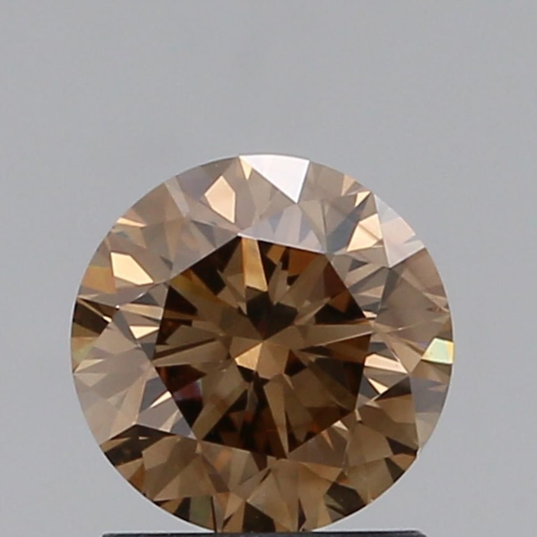 Loose Diamond - ROUND 1.12ct Brown VS2: Loose Diamond - ROUND 1.12ct Brown VS2 Source: Natural Shape: ROUND Carats: 1.12 Color: Brown Certification: NONE Video: