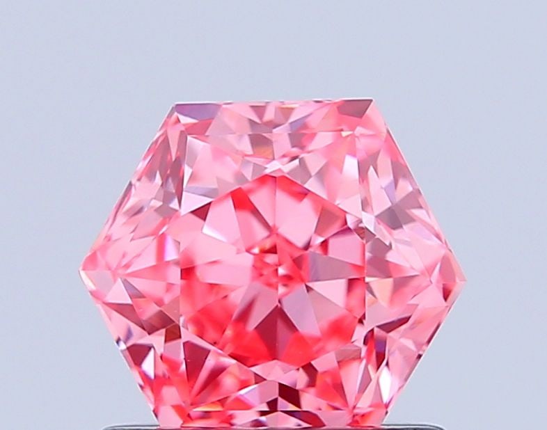 Loose Diamond - HEXAGONAL 1.03ct Fancy Vivid Pink VS1: Loose Diamond - HEXAGONAL 1.03ct Fancy Vivid Pink VS1 Source: This is a real non-mined Diamond that has been grown in a lab Shape: HEXAGONAL Carats: 1.03 Color: Fancy Vivid Pink Certification: IGI