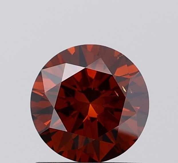 Loose Diamond - ROUND 1.04ct Fancy Deep Brown VS2: Loose Diamond - ROUND 1.04ct Fancy Deep Brown VS2 Source: This is a real non-mined Diamond that has been grown in a lab Shape: ROUND Carats: 1.04 Color: Fancy Deep Brown Certification: IGI Video: