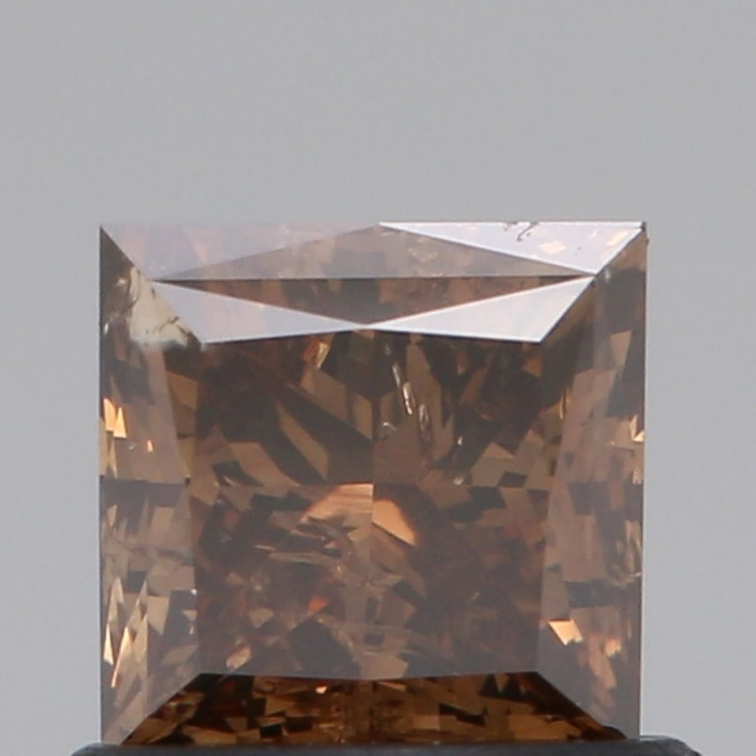 Loose Diamond - PRINCESS 0.75ct Fancy Vivid Brown SI2: Loose Diamond - PRINCESS 0.75ct Fancy Vivid Brown SI2 Source: Natural Shape: PRINCESS Carats: 0.75 Color: Fancy Vivid Brown Certification: NONE Video:
