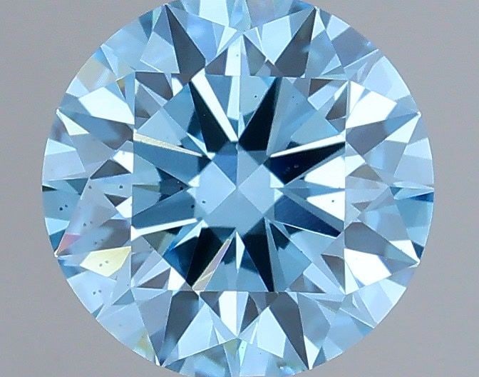 Ideal Loose Diamond - ROUND 0.7ct Fancy Vivid Blue VS2: Ideal Loose Diamond - ROUND 0.7ct Fancy Vivid Blue VS2 Source: This is a real non-mined Diamond that has been grown in a lab Shape: ROUND Carats: 0.7 Color: Fancy Vivid Blue Certification: IGI Video: