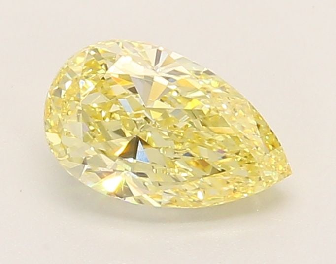 Loose Diamond - PEAR 0.99ct Fancy Intense Yellow VS1: Loose Diamond - PEAR 0.99ct Fancy Intense Yellow VS1 Source: This is a real non-mined Diamond that has been grown in a lab Shape: PEAR Carats: 0.99 Color: Fancy Intense Yellow Certification: IGI