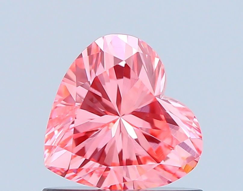 Loose Diamond - HEART 0.68ct Fancy Vivid Pink VS1: Loose Diamond - HEART 0.68ct Fancy Vivid Pink VS1 Source: This is a real non-mined Diamond that has been grown in a lab Shape: HEART Carats: 0.68 Color: Fancy Vivid Pink Certification: IGI Video: