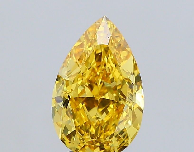 Loose Diamond - PEAR 3.0ct Fancy Vivid Yellow VS2: Loose Diamond - PEAR 3.0ct Fancy Vivid Yellow VS2 Source: This is a real non-mined Diamond that has been grown in a lab Shape: PEAR Carats: 3.0 Color: Fancy Vivid Yellow Certification: IGI Video: