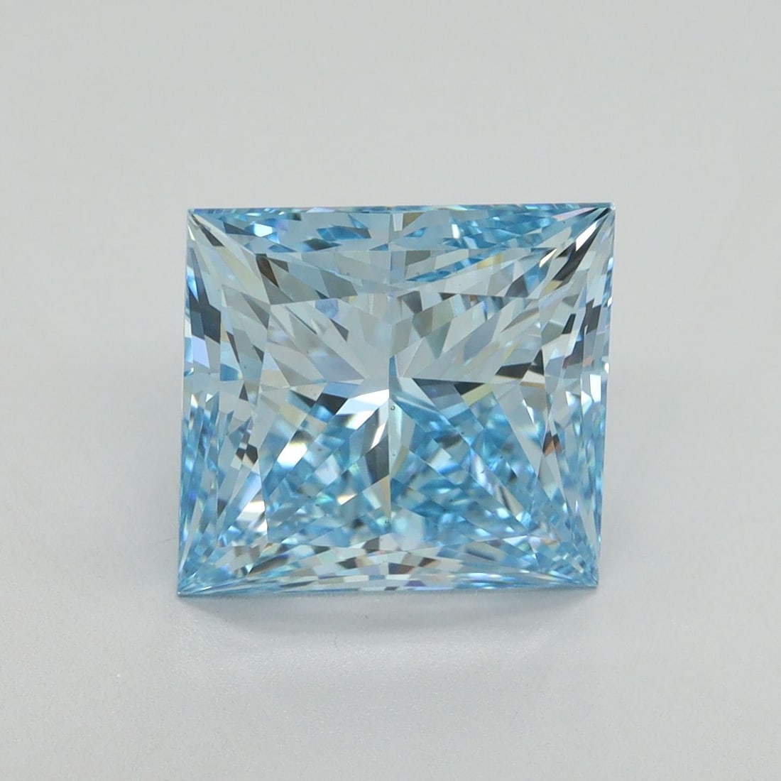 Loose Diamond - PRINCESS 5.08ct Fancy Vivid Blue VS2: Loose Diamond - PRINCESS 5.08ct Fancy Vivid Blue VS2 Source: This is a real non-mined Diamond that has been grown in a lab Shape: PRINCESS Carats: 5.08 Color: Fancy Vivid Blue Certification: IGI Video