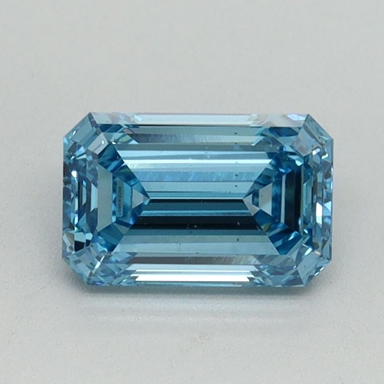 Loose Diamond - EMERALD 1.02ct Fancy Vivid Blue VS2: Loose Diamond - EMERALD 1.02ct Fancy Vivid Blue VS2 Source: This is a real non-mined Diamond that has been grown in a lab Shape: EMERALD Carats: 1.02 Color: Fancy Vivid Blue Certification: IGI Video: