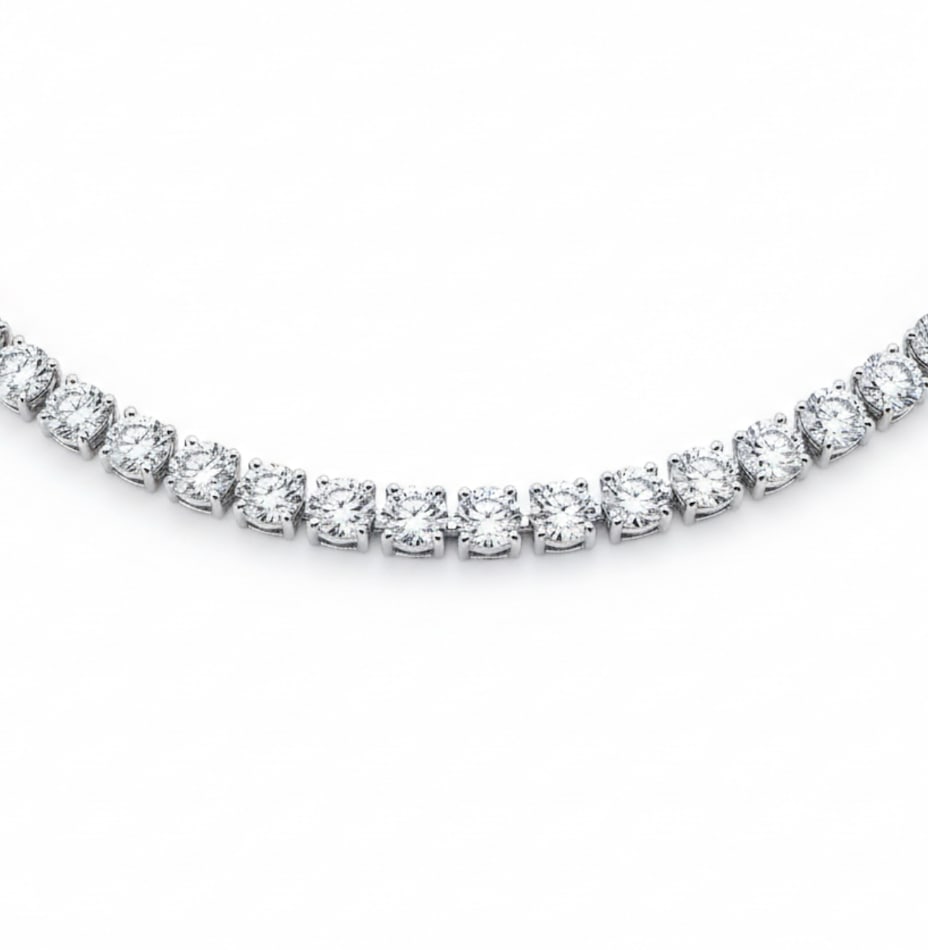 14K White Gold Lab Grown Diamond 10 Ct.Tw. Tennies Necklace 17: 14K White Gold Lab Grown Diamond 10 Ct.Tw. Tennies Necklace 17 A bold yet graceful masterpiece, this 10 CT TW tennis necklace is set in luxurious 14K white gold and adorned with dazzling lab-grown dia
