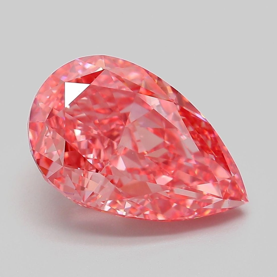 Loose Diamond - PEAR 5.28ct Fancy Vivid Pink VVS2: Loose Diamond - PEAR 5.28ct Fancy Vivid Pink VVS2 Source: This is a real non-mined Diamond that has been grown in a lab Shape: PEAR Carats: 5.28 Color: Fancy Vivid Pink Certification: IGI Video: