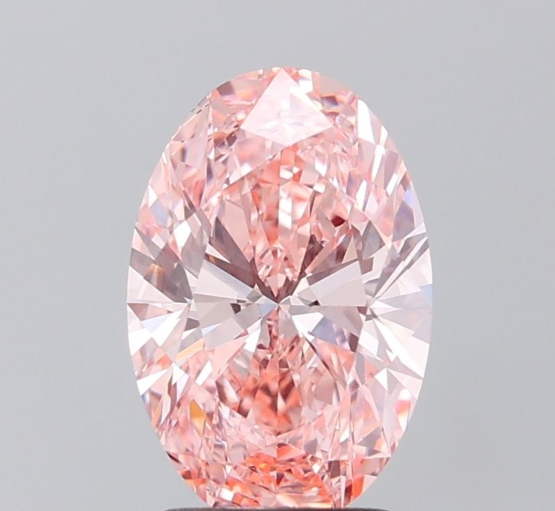 Loose Diamond - OVAL 2.07ct Fancy Vivid Pink VVS2: Loose Diamond - OVAL 2.07ct Fancy Vivid Pink VVS2 Source: This is a real non-mined Diamond that has been grown in a lab Shape: OVAL Carats: 2.07 Color: Fancy Vivid Pink Certification: IGI Video: