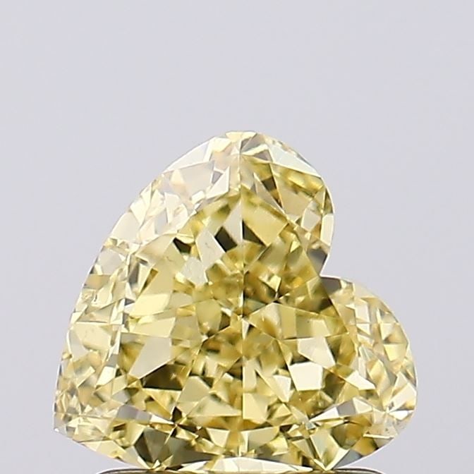 Loose Diamond - HEART 1.19ct Fancy Vivid Yellow VS1: Loose Diamond - HEART 1.19ct Fancy Vivid Yellow VS1 Source: This is a real non-mined Diamond that has been grown in a lab Shape: HEART Carats: 1.19 Color: Fancy Vivid Yellow Certification: IGI Video: