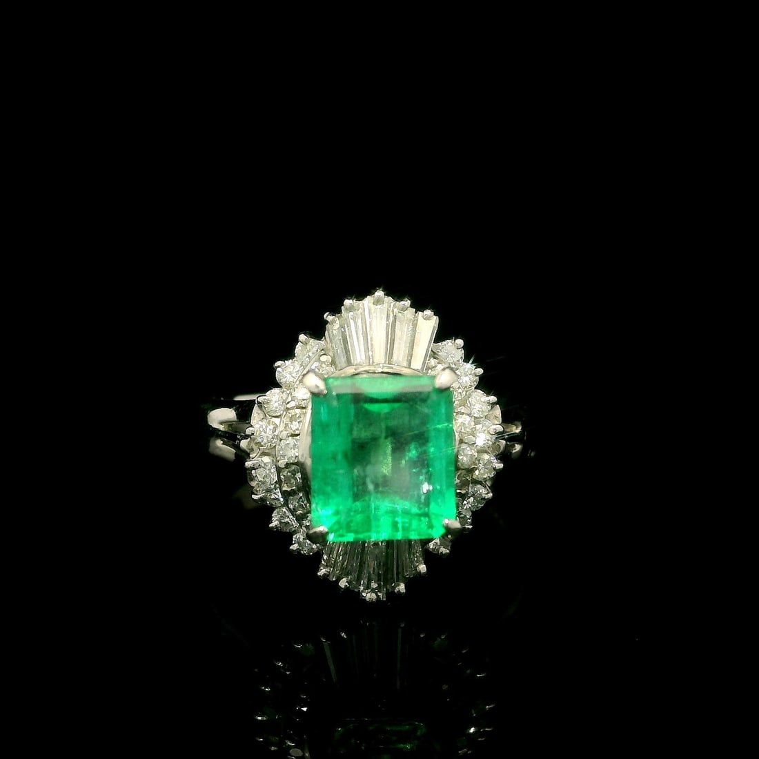 Vintage Platinum 2.41ctw Emerald Diamond Ballerina Cocktail Ring: Vintage Platinum 2.41ctw Emerald Diamond Ballerina Cocktail Ring This exquisite vintage cocktail ring showcases a stunning 2.41ctw of emerald and diamond brilliance. The centerpiece is a natural