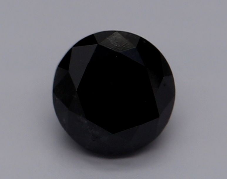 Loose Diamond - ROUND 0.74ct Fancy Black VVS2: Loose Diamond - ROUND 0.74ct Fancy Black VVS2 Source: Natural Shape: ROUND Carats: 0.74 Color: Fancy Black Certification: GIA Video: