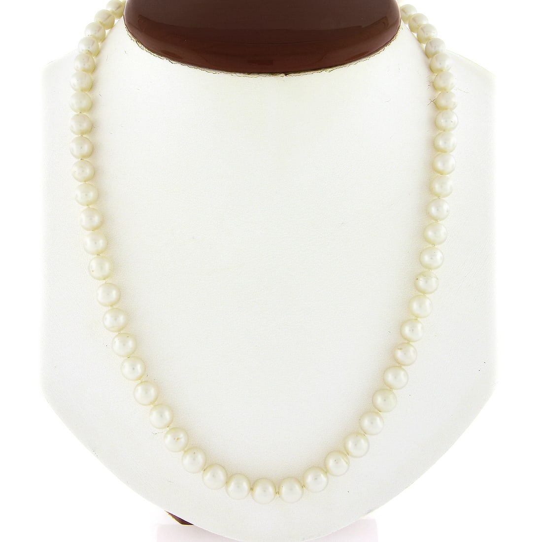 Estate 18 Inch Classic Pearl Necklace 14k Gold Filigree Clasp: Estate 18 Inch Classic Pearl Necklace 14k Gold Filigree Clasp This elegant estate necklace features a classic design with a single strand of 63 genuine cultured pearls, each measuring between 6.5mm