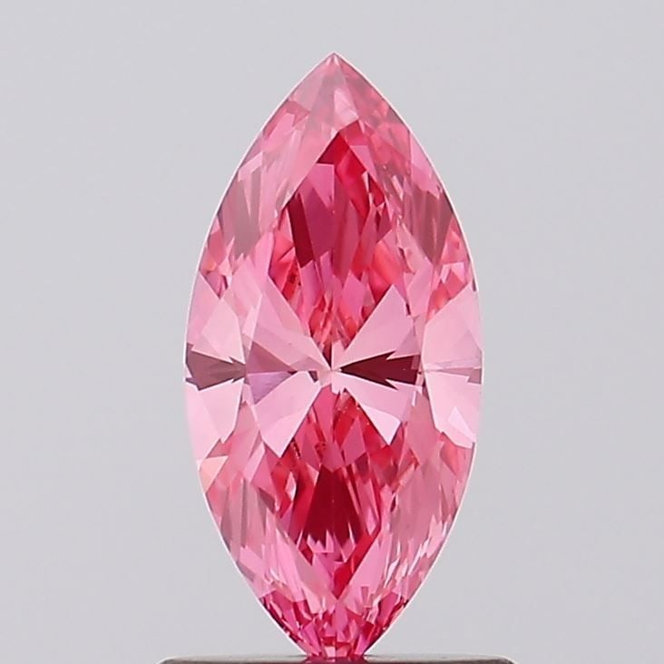 Loose Diamond - MARQUISE 0.87ct Fancy Vivid Pink VS1: Loose Diamond - MARQUISE 0.87ct Fancy Vivid Pink VS1 Source: This is a real non-mined Diamond that has been grown in a lab Shape: MARQUISE Carats: 0.87 Color: Fancy Vivid Pink Certification: IGI