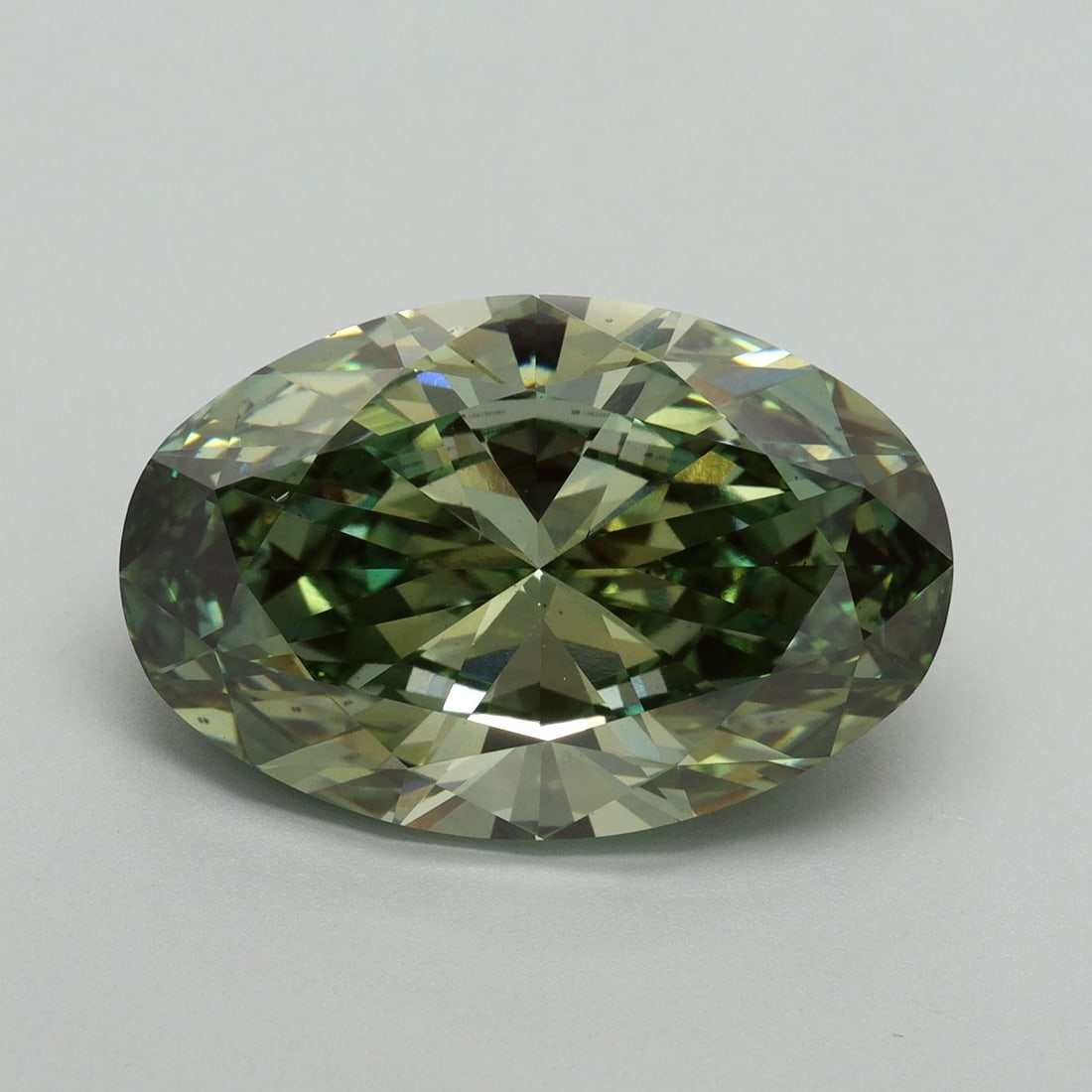 Loose Diamond - OVAL 8.01ct Fancy Vivid Green VS1: Loose Diamond - OVAL 8.01ct Fancy Vivid Green VS1 Source: This is a real non-mined Diamond that has been grown in a lab Shape: OVAL Carats: 8.01 Color: Fancy Vivid Green Certification: IGI Video: