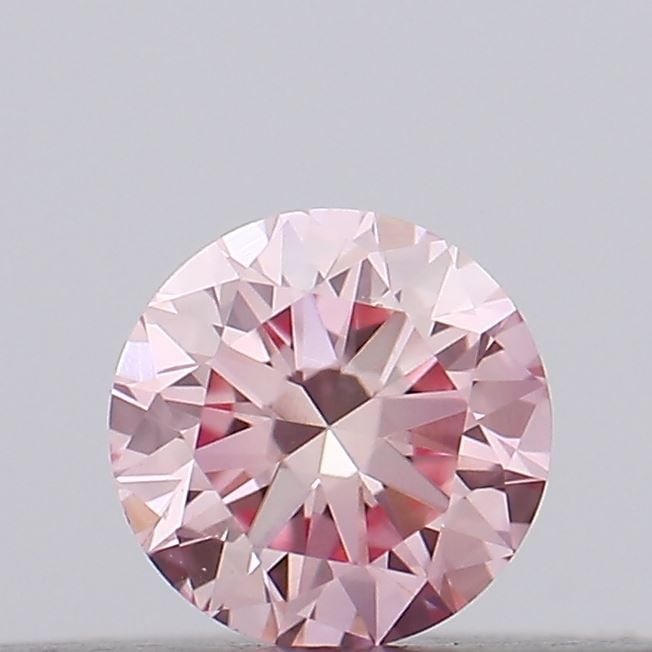 Loose Diamond - ROUND 0.14ct Fancy Vivid Pink VS1: Loose Diamond - ROUND 0.14ct Fancy Vivid Pink VS1 Source: This is a real non-mined Diamond that has been grown in a lab Shape: ROUND Carats: 0.14 Color: Fancy Vivid Pink Certification: IGI Video:
