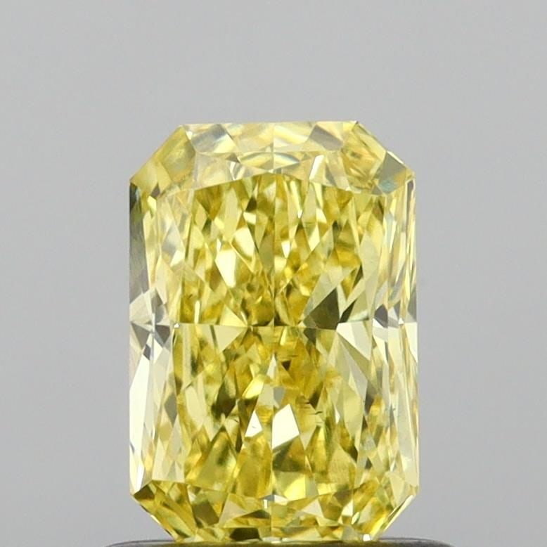 Loose Diamond - RADIANT 0.79ct Fancy Vivid Yellow VS2: Loose Diamond - RADIANT 0.79ct Fancy Vivid Yellow VS2 Source: This is a real non-mined Diamond that has been grown in a lab Shape: RADIANT Carats: 0.79 Color: Fancy Vivid Yellow Certification: IGI