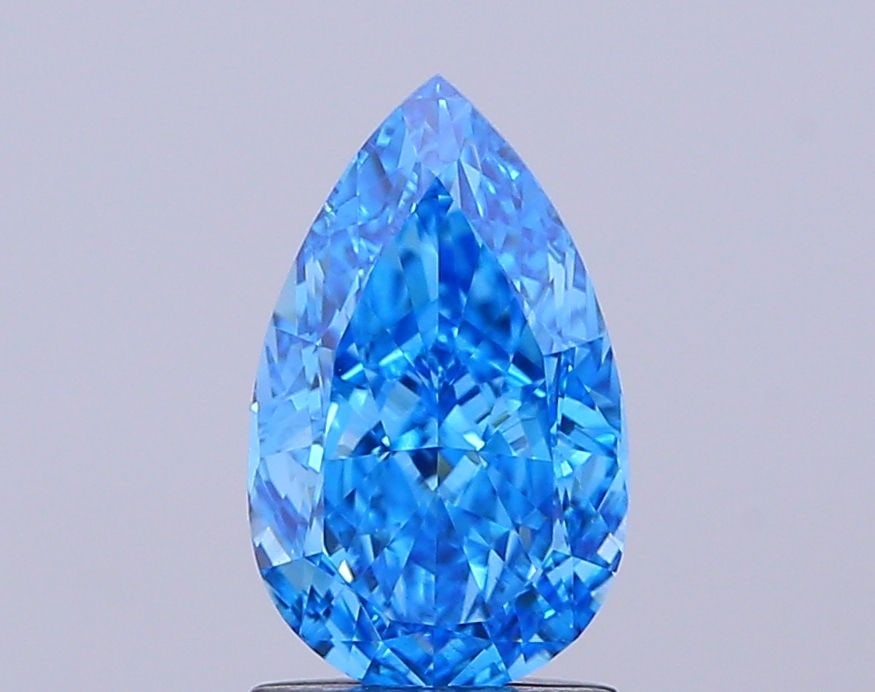 Loose Diamond - PEAR 1.68ct Fancy Vivid Blue VS1: Loose Diamond - PEAR 1.68ct Fancy Vivid Blue VS1 Source: This is a real non-mined Diamond that has been grown in a lab Shape: PEAR Carats: 1.68 Color: Fancy Vivid Blue Certification: IGI Video: Video
