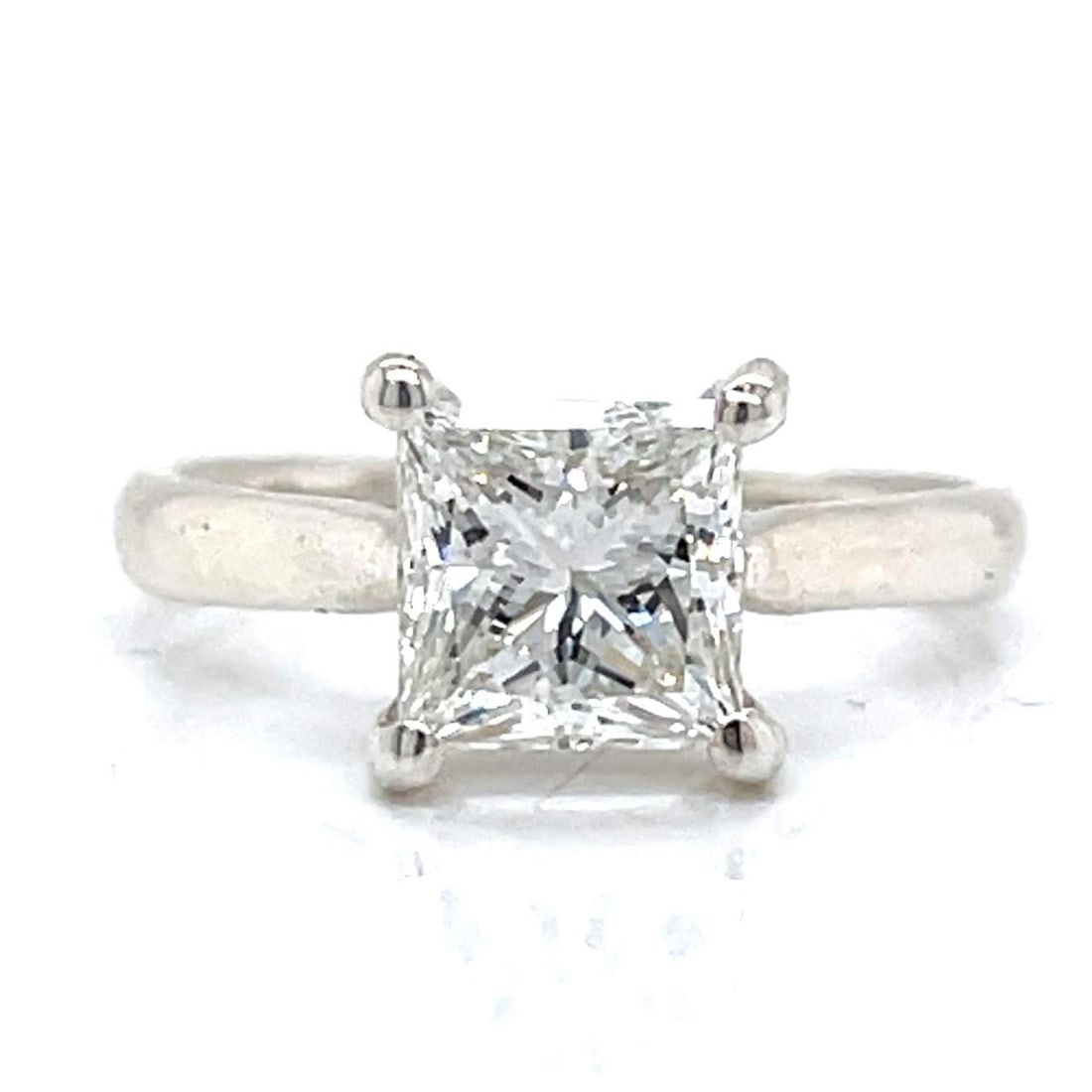 GIA Certified 2.05 Ct Princess-Cut Diamond Ring in Silver: GIA Certified 2.05 Ct Princess-Cut Diamond Ring in Silver This stunning diamond ring features a magnificent GIA Certified 2.05 Ct. princess-cut diamond, exhibiting H color and VS1 clarity. Crafted in 