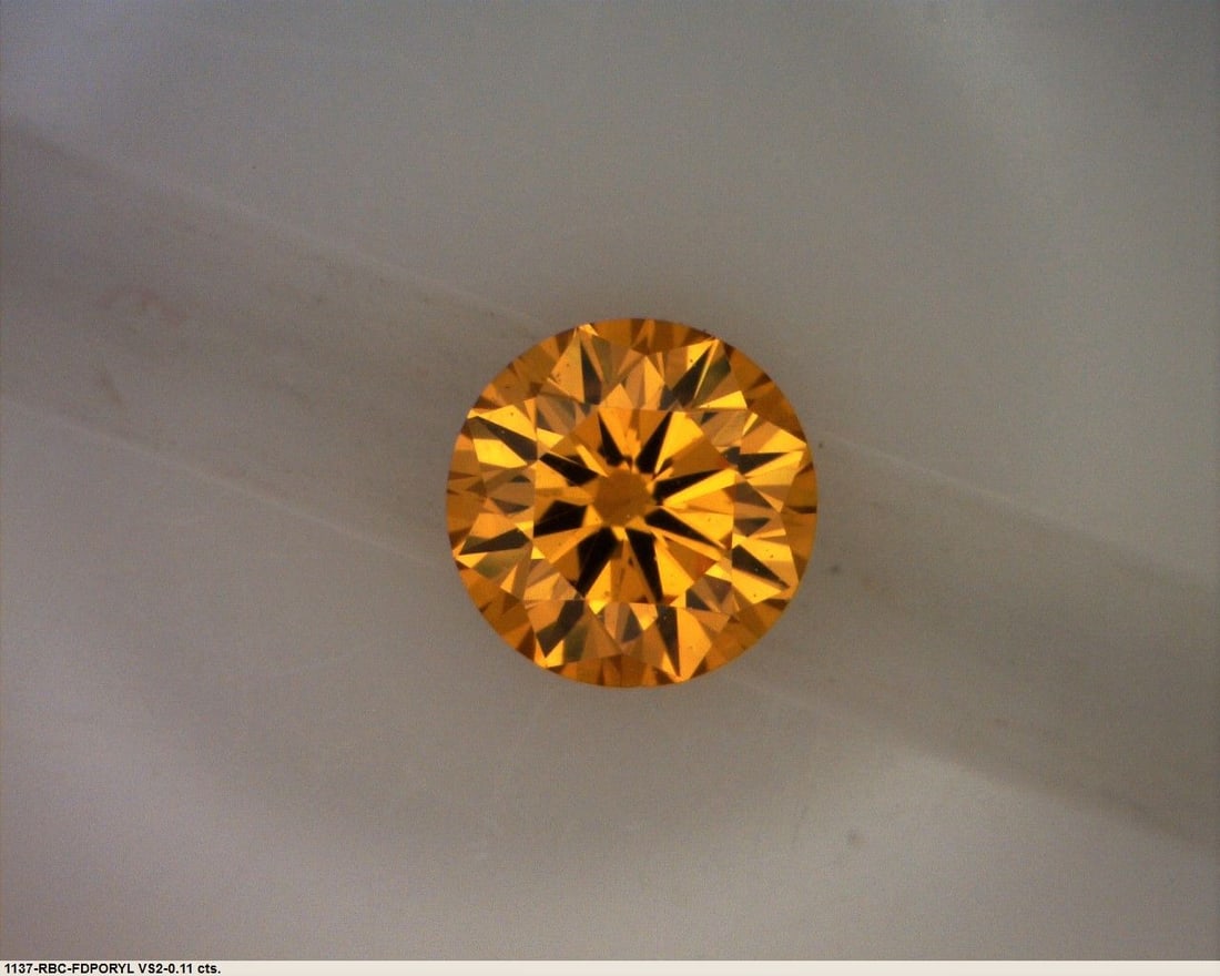 Loose Diamond - ROUND 0.11ct Fancy Deep Orange Yellow: Loose Diamond - ROUND 0.11ct Fancy Deep Orange Yellow Source: Natural Shape: ROUND Carats: 0.11 Color: Fancy Deep Orange Yellow Certification: GIA PLEASE NOTE: Framed, Large, or heavy items do not hav