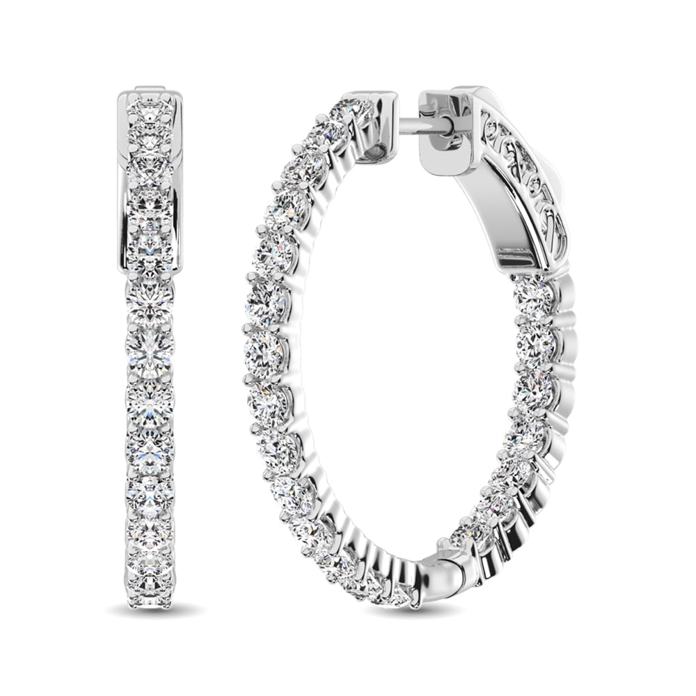 10K White Gold Diamond 2 Ct.Tw. In and Out Hoop Earrings: 10K White Gold Diamond 2 Ct.Tw. In and Out Hoop Earrings These stunning earrings are available in 10K White Gold. There are 21 round diamonds with a total carat weight of 2 Ct.Tw. set in a Prong setti