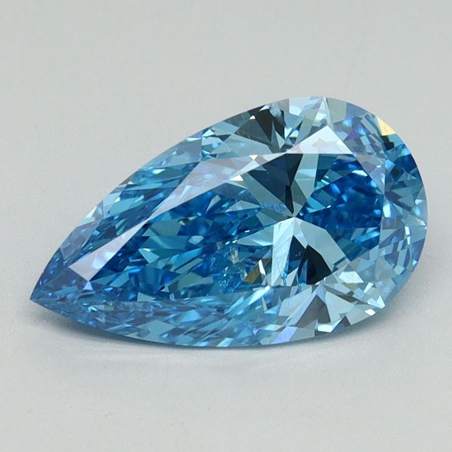 Loose Diamond - PEAR 1.55ct Fancy Vivid Blue VS2: Loose Diamond - PEAR 1.55ct Fancy Vivid Blue VS2 Source: This is a real non-mined Diamond that has been grown in a lab Shape: PEAR Carats: 1.55 Color: Fancy Vivid Blue Certification: IGI Video: Video