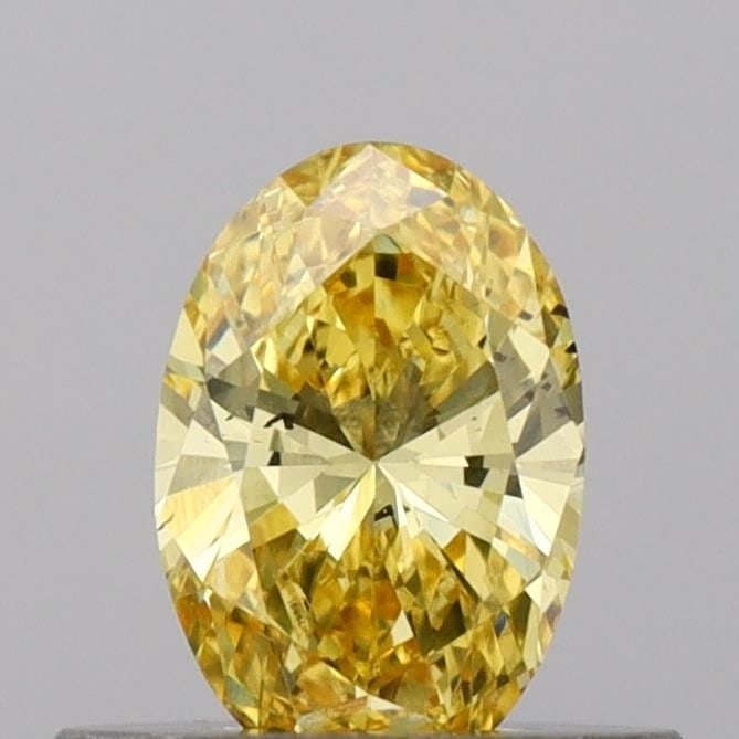 Loose Diamond - OVAL 0.41ct Fancy Vivid Yellow SI1: Loose Diamond - OVAL 0.41ct Fancy Vivid Yellow SI1 Source: This is a real non-mined Diamond that has been grown in a lab Shape: OVAL Carats: 0.41 Color: Fancy Vivid Yellow Certification: IGI Video: