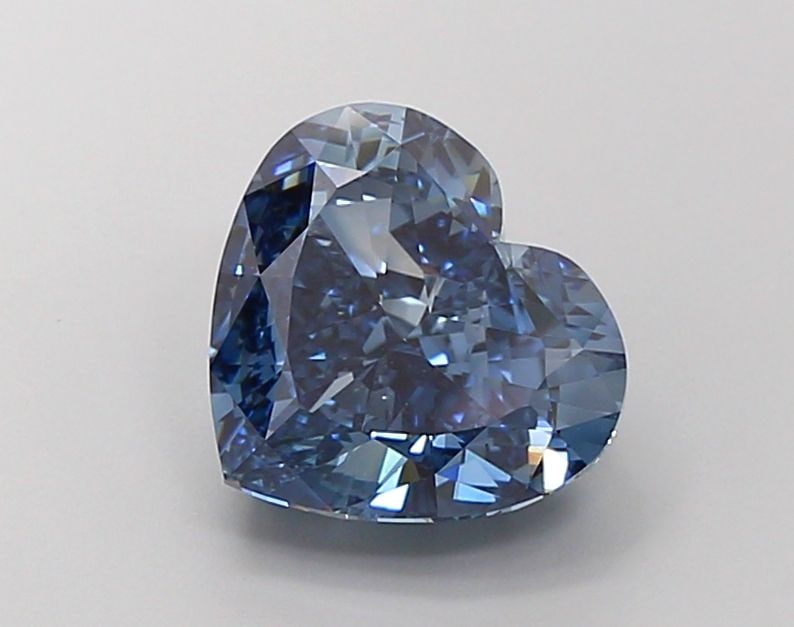 Loose Diamond - HEART 5.02ct Fancy Vivid Blue VVS2: Loose Diamond - HEART 5.02ct Fancy Vivid Blue VVS2 Source: This is a real non-mined Diamond that has been grown in a lab Shape: HEART Carats: 5.02 Color: Fancy Vivid Blue Certification: IGI Video: