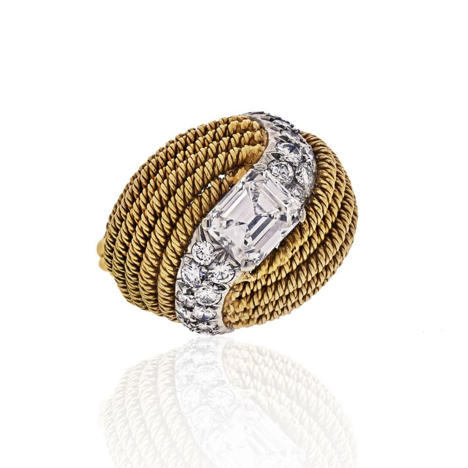 David Webb 2.13 Carat Emerald Cut Diamond Ring Platinum 18K Gold Certified: David Webb 2.13 Carat Emerald Cut Diamond Ring Platinum 18K Gold Certified This stunning David Webb ring features a 2.13 carat emerald cut diamond, elegantly set in a unique design that transcends
