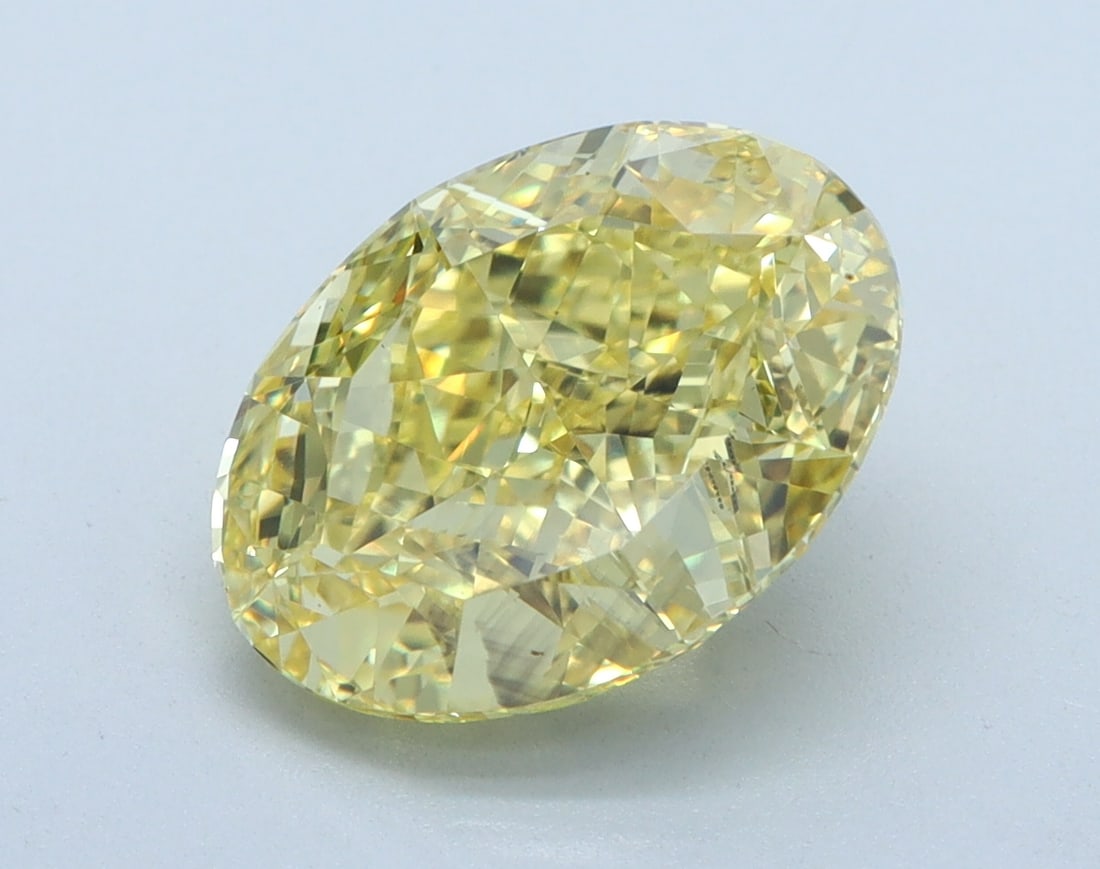 Loose Diamond - OVAL 3.03ct YELLOW SI1: Loose Diamond - OVAL 3.03ct YELLOW SI1 Source: This is a real non-mined Diamond that has been grown in a lab Shape: OVAL Carats: 3.03 Color: YELLOW Clarity: SI1 Certification: IGI Condition: