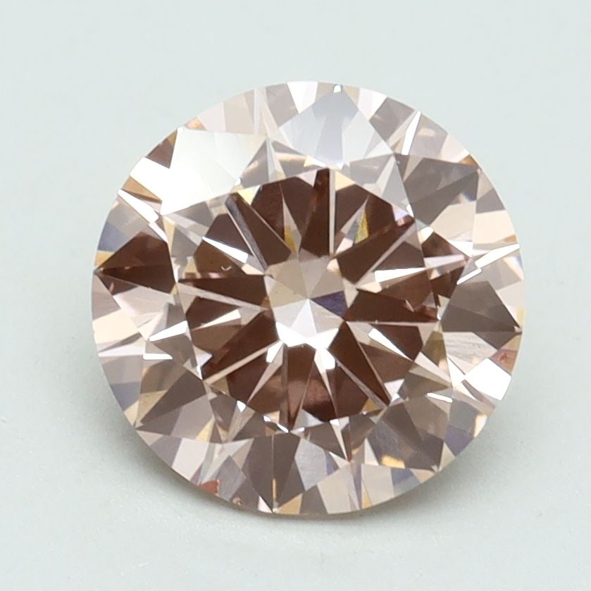 Loose Diamond - ROUND 2.05ct Fancy Intense Pink VS2: Loose Diamond - ROUND 2.05ct Fancy Intense Pink VS2 Source: This is a real non-mined Diamond that has been grown in a lab Shape: ROUND Carats: 2.05 Color: Fancy Intense Pink Certification: IGI Video: