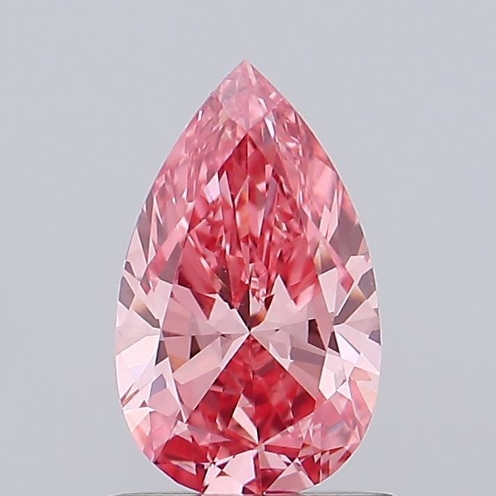 Loose Diamond - PEAR 0.86ct Fancy Vivid Pink VVS2: Loose Diamond - PEAR 0.86ct Fancy Vivid Pink VVS2 Source: This is a real non-mined Diamond that has been grown in a lab Shape: PEAR Carats: 0.86 Color: Fancy Vivid Pink Certification: IGI Video: