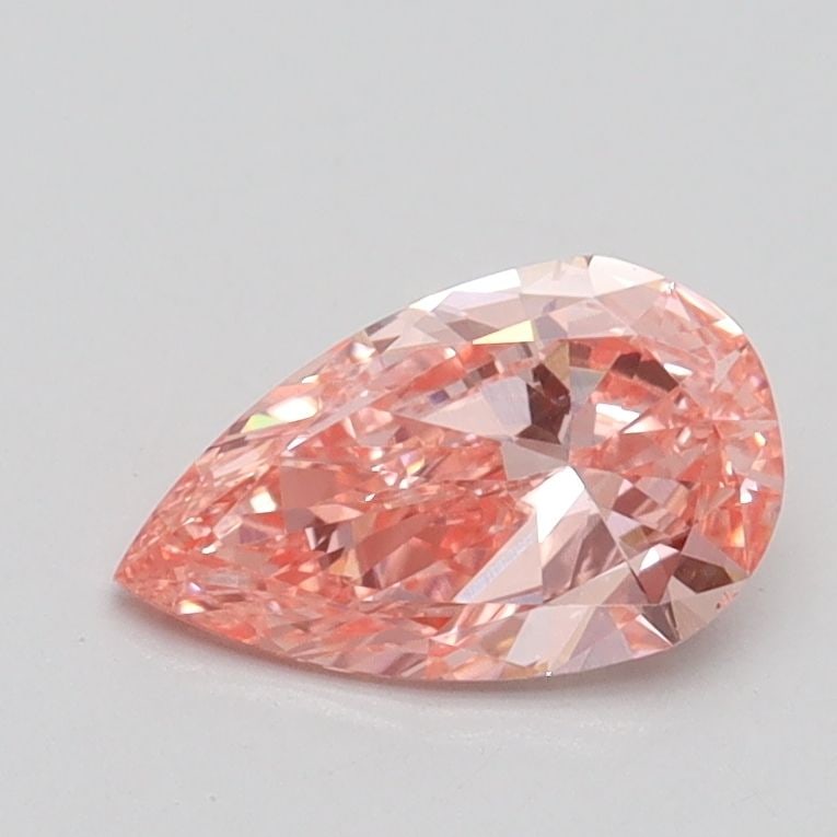 Loose Diamond - PEAR 0.7ct Fancy Vivid Pink VS1: Loose Diamond - PEAR 0.7ct Fancy Vivid Pink VS1 Source: This is a real non-mined Diamond that has been grown in a lab Shape: PEAR Carats: 0.7 Color: Fancy Vivid Pink Certification: IGI Video: