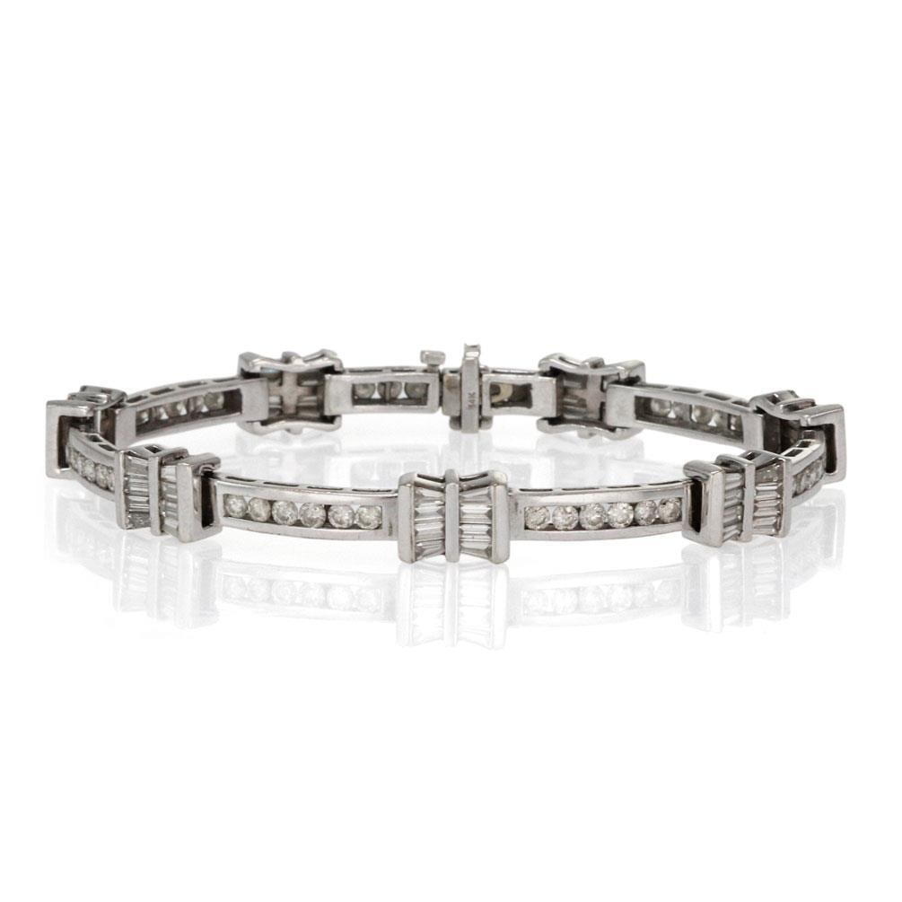 14k White Gold 5.00ct Diamond Bar Link Bracelet: 14k White Gold 5.00ct Diamond Bar Link Bracelet This exquisite bracelet is designed in 14k white gold and features alternating 4mm wide slim curved bars embellished with round cut diamonds. It also sh