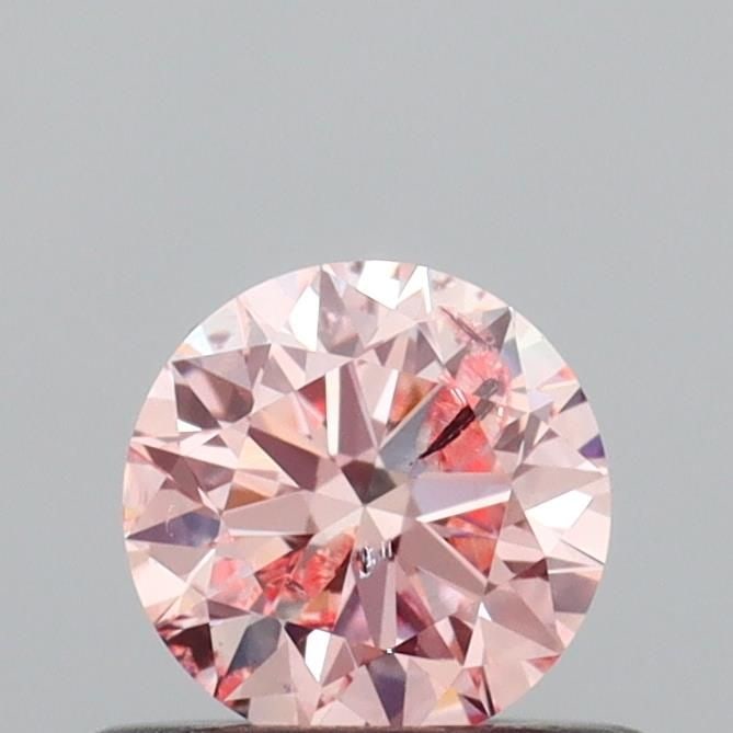Loose Diamond - ROUND 0.46ct Fancy Intense Pink I1: Loose Diamond - ROUND 0.46ct Fancy Intense Pink I1 Source: This is a real non-mined Diamond that has been grown in a lab Shape: ROUND Carats: 0.46 Color: Fancy Intense Pink Certification: IGI Video: