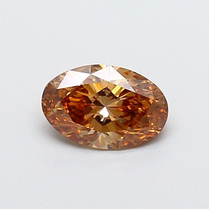Loose Diamond - OVAL 1.0ct Fancy Pinkish Brown VVS2: Loose Diamond - OVAL 1.0ct Fancy Pinkish Brown VVS2 Source: This is a real non-mined Diamond that has been grown in a lab Shape: OVAL Carats: 1.0 Color: Fancy Pinkish Brown Certification: IGI Video: