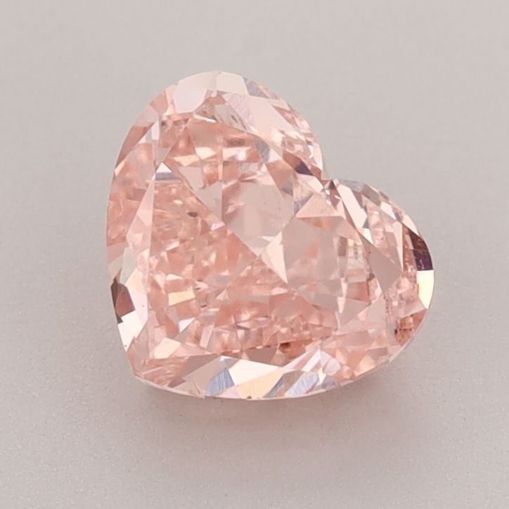 Loose Diamond - HEART 1.52ct Fancy Vivid Pink VS2: Loose Diamond - HEART 1.52ct Fancy Vivid Pink VS2 Source: This is a real non-mined Diamond that has been grown in a lab Shape: HEART Carats: 1.52 Color: Fancy Vivid Pink Certification: IGI Video: