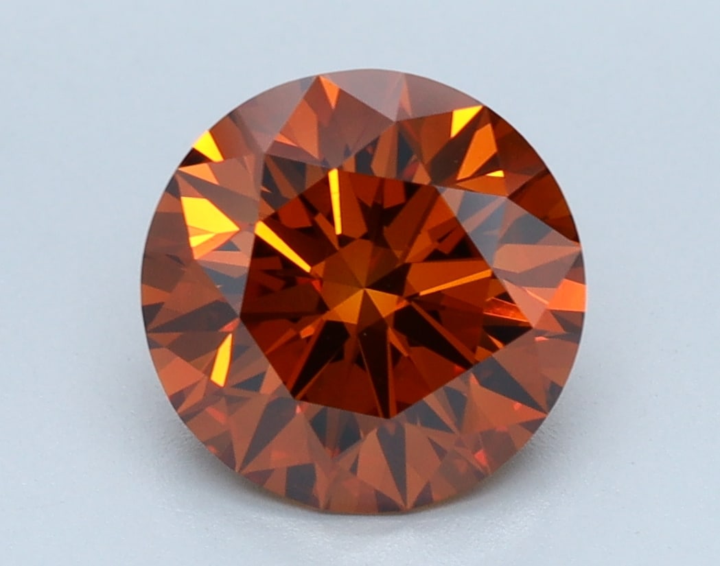 Loose Diamond - Round 2ct ORANGE VVS2: Loose Diamond - Round 2ct ORANGE VVS2 Source: This is a real non-mined Diamond that has been grown in a lab Shape: Round Carats: 2 Color: ORANGE Clarity: VVS2 Certification: IGI Condition: Pre-Owned P