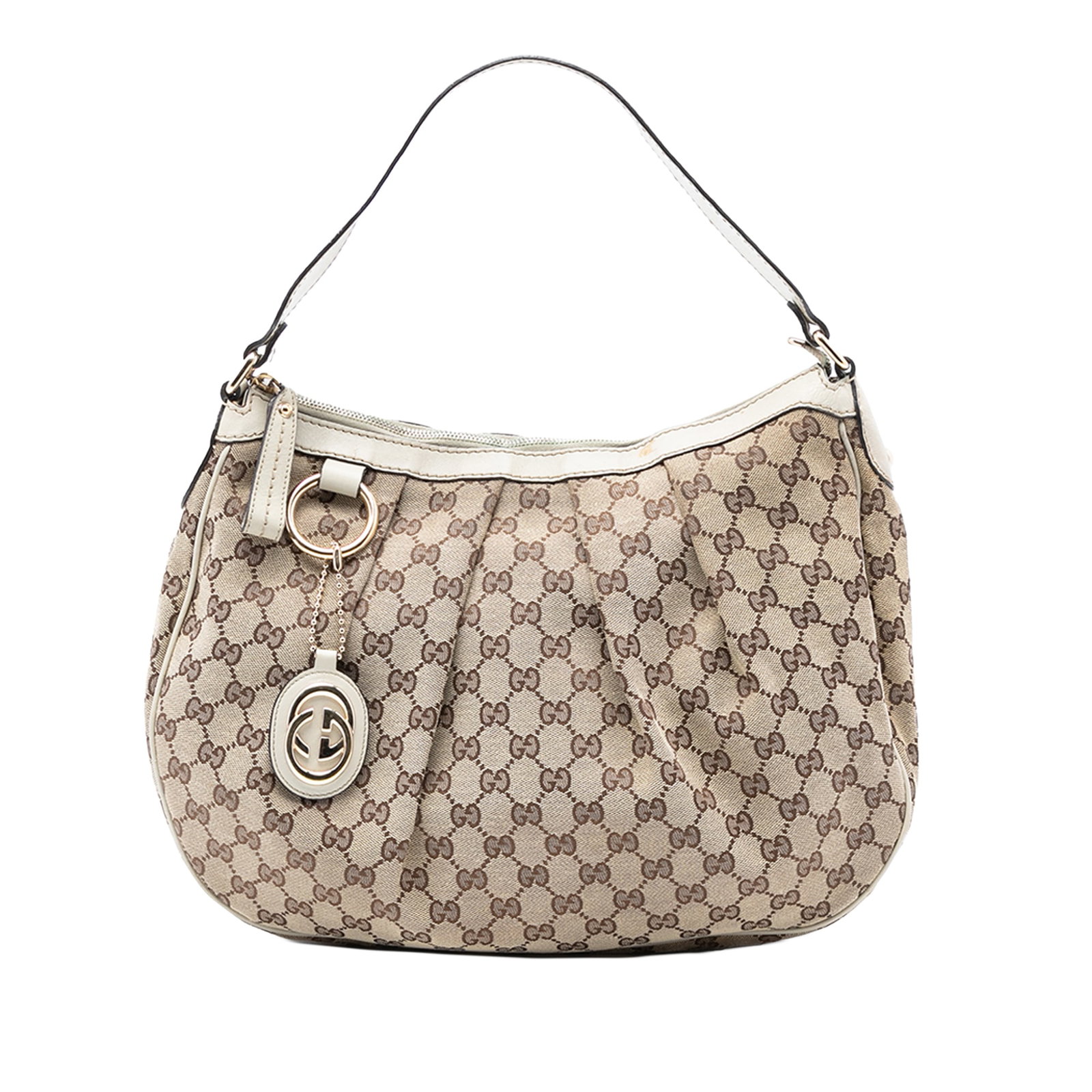 Gucci Sukey Beige Canvas Shoulder Purse with Leather Trim: Gucci Sukey Beige Canvas Shoulder Purse with Leather Trim The Gucci GG Canvas Sukey Shoulder Bag showcases a canvas body with leather trim and a flat leather strap. It features a top zip closure and o