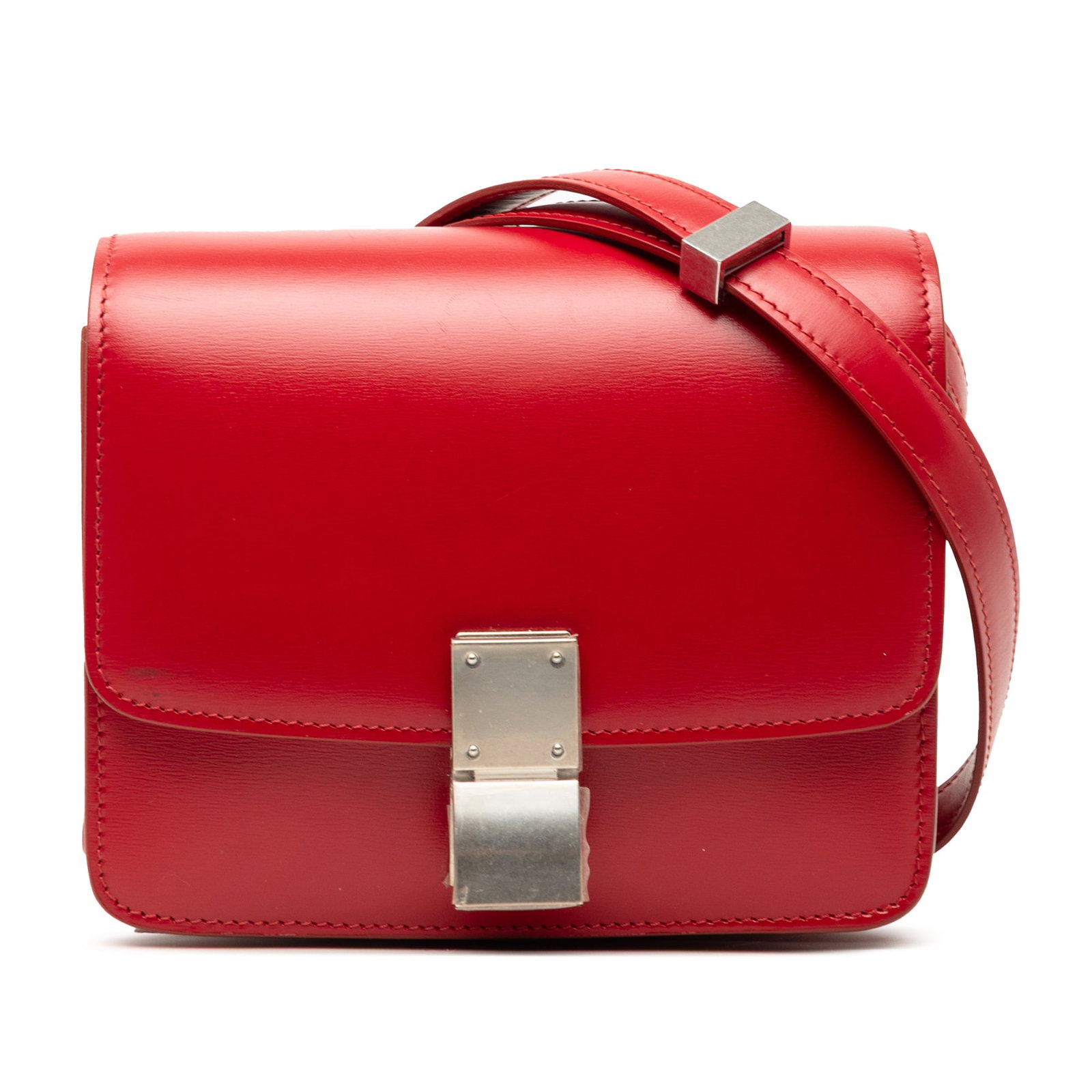 Celine red calfskin crossbody box bag: Celine red calfskin crossbody box bag This Celine Small Calfskin Classic Box crossbody bag is crafted from leather and features a sleek, structured silhouette. It is designed with a flat leather strap