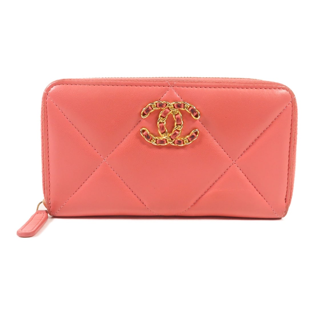 CHANEL Pink Lambskin Leather Round Wallet with GHW: CHANEL Pink Lambskin Leather Round Wallet with GHW This CHANEL round wallet is crafted from luxurious lambskin leather in a lovely pink hue. Made in France, it features a stylish design that combines 